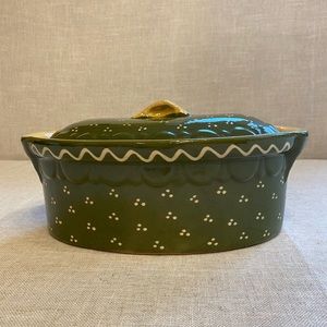 Ceramic pottery serving dish with lid.